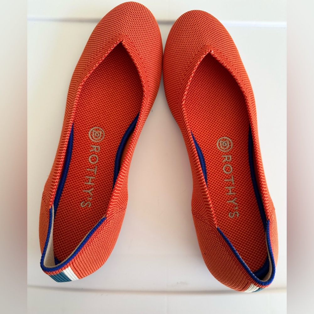 Rothy's Bright Orange Flats with Blue Accents